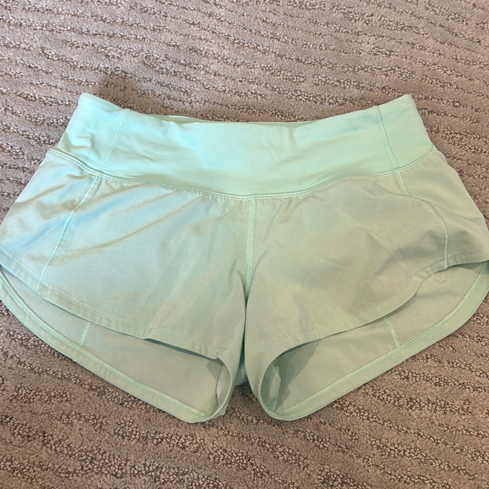 Mint green Lululemon speed up shorts 2.5 inch size 2. Low rise